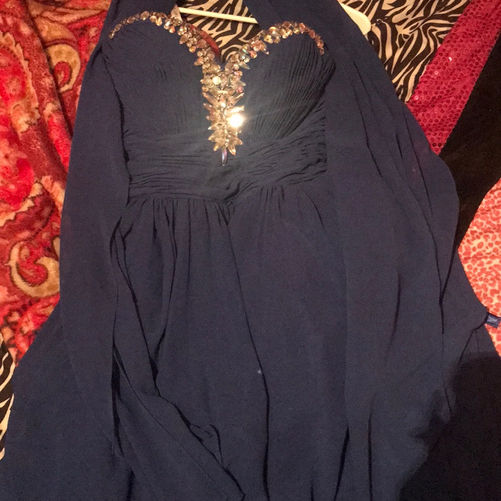 I’m selling a blue rhinestone dress
